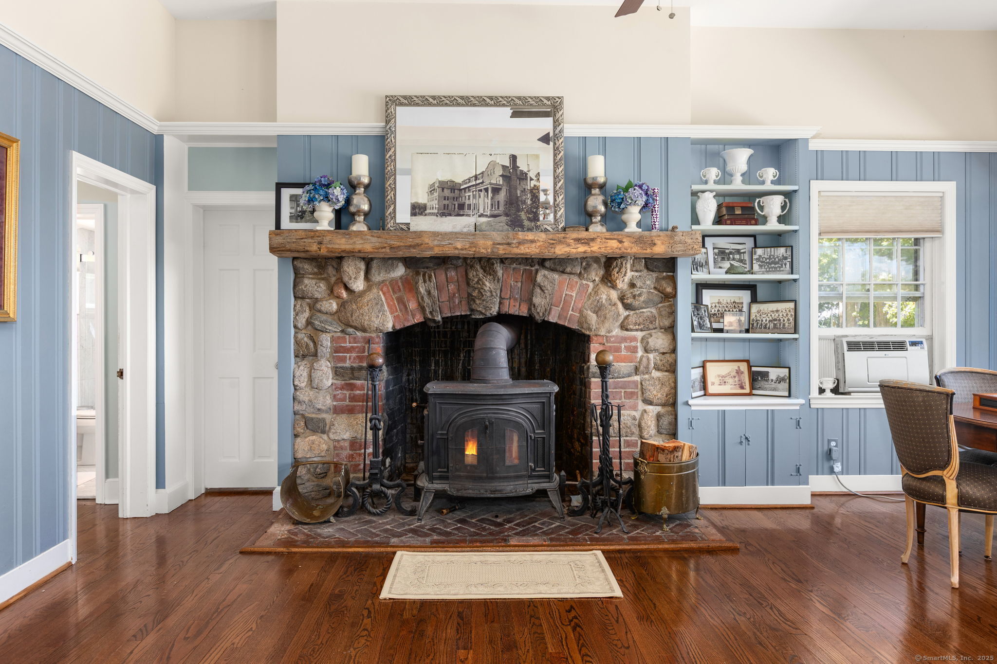 803 North Salem Road Ridgefield, CT 06877 - Photo 13 of 40 a living room with furniture and a fireplace