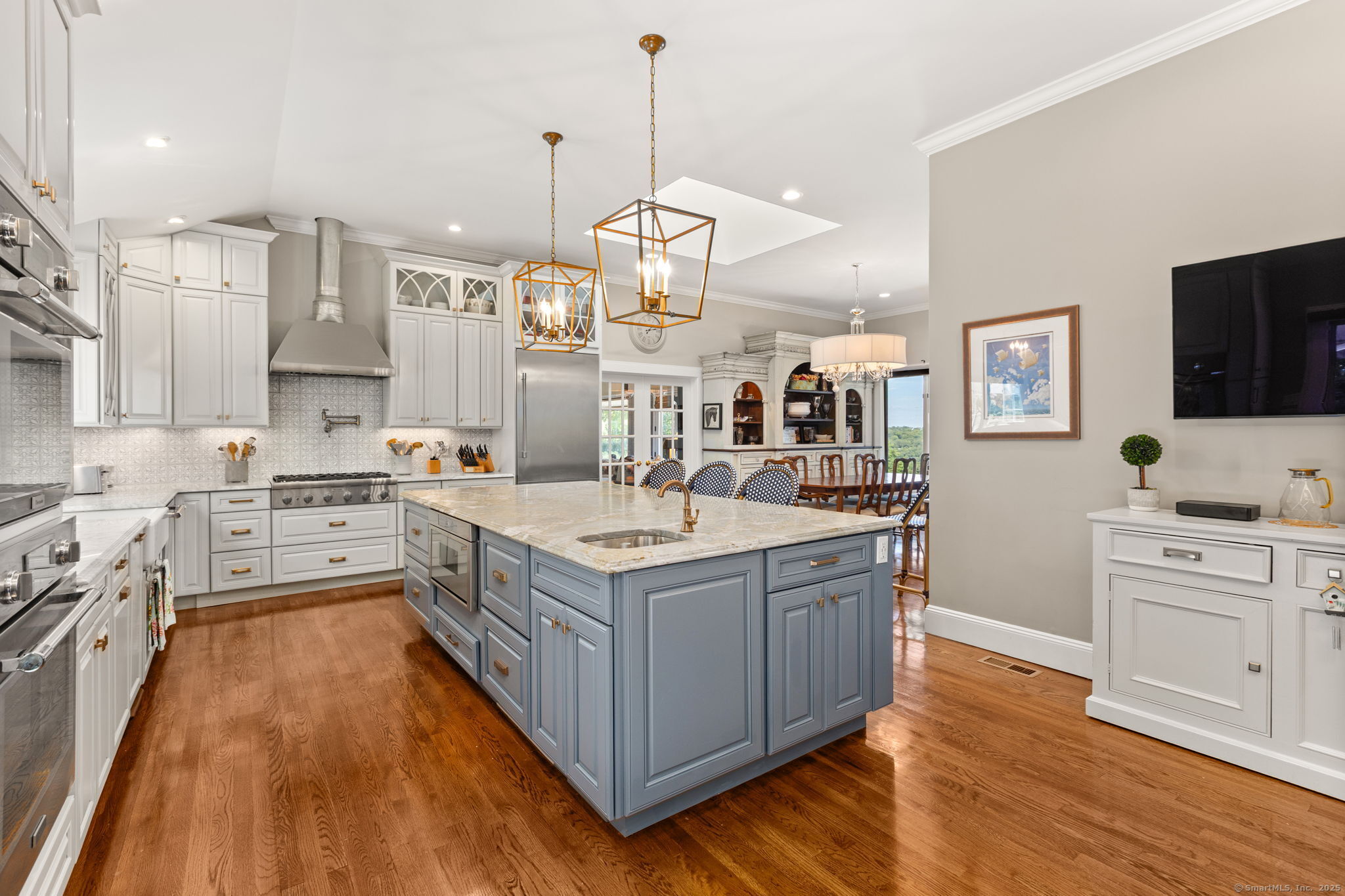 803 North Salem Road Ridgefield, CT 06877 - Photo 15 of 40 a large kitchen with stainless steel appliances granite countertop a stove and cabinets