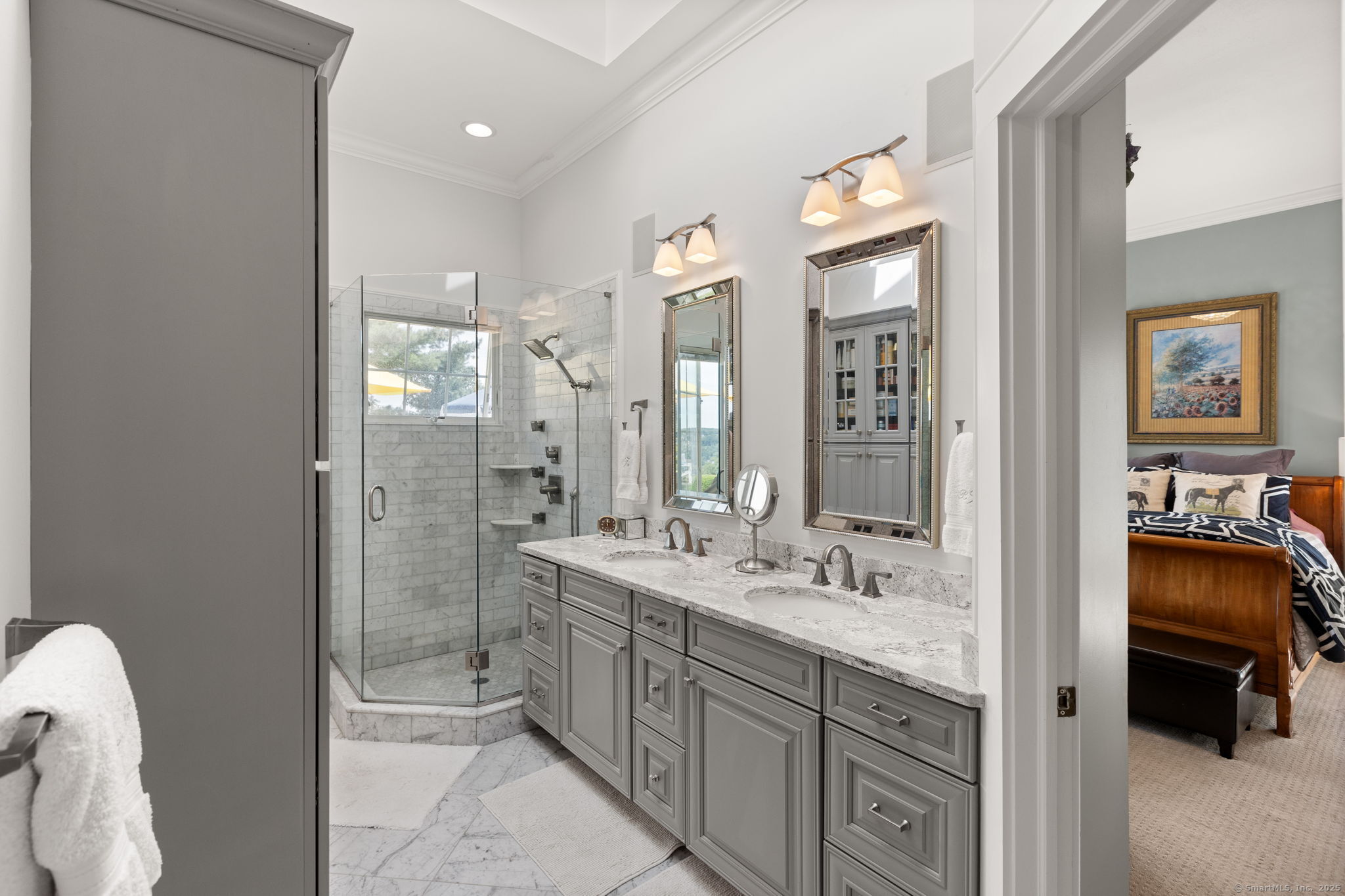 803 North Salem Road Ridgefield, CT 06877 - Photo 21 of 40 a spacious bathroom with a double vanity sink a mirror and a shower