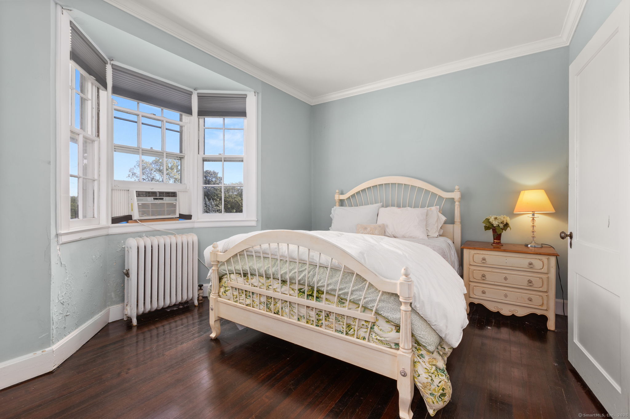 803 North Salem Road Ridgefield, CT 06877 - Photo 26 of 40 a bedroom with a bed and a large window