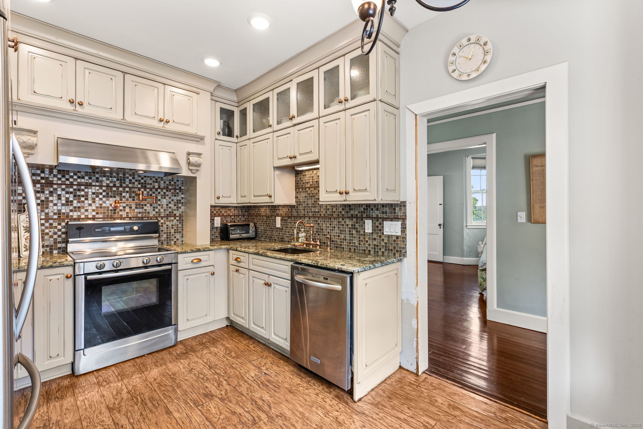 803 North Salem Road Ridgefield, CT 06877 - Photo 29 of 40 a kitchen with stainless steel appliances granite countertop a stove and a sink