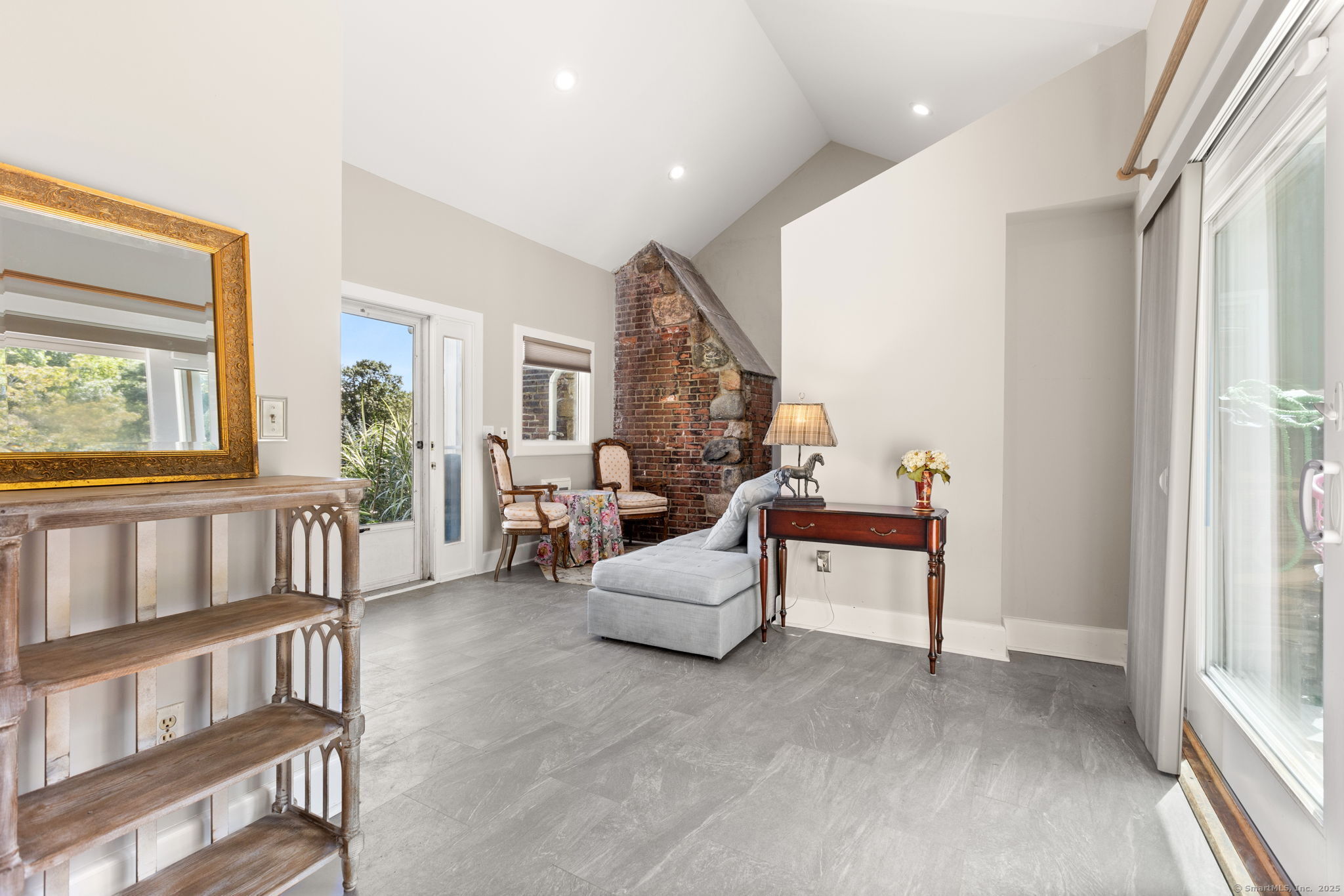 803 North Salem Road Ridgefield, CT 06877 - Photo 30 of 40 a living room with furniture and a window
