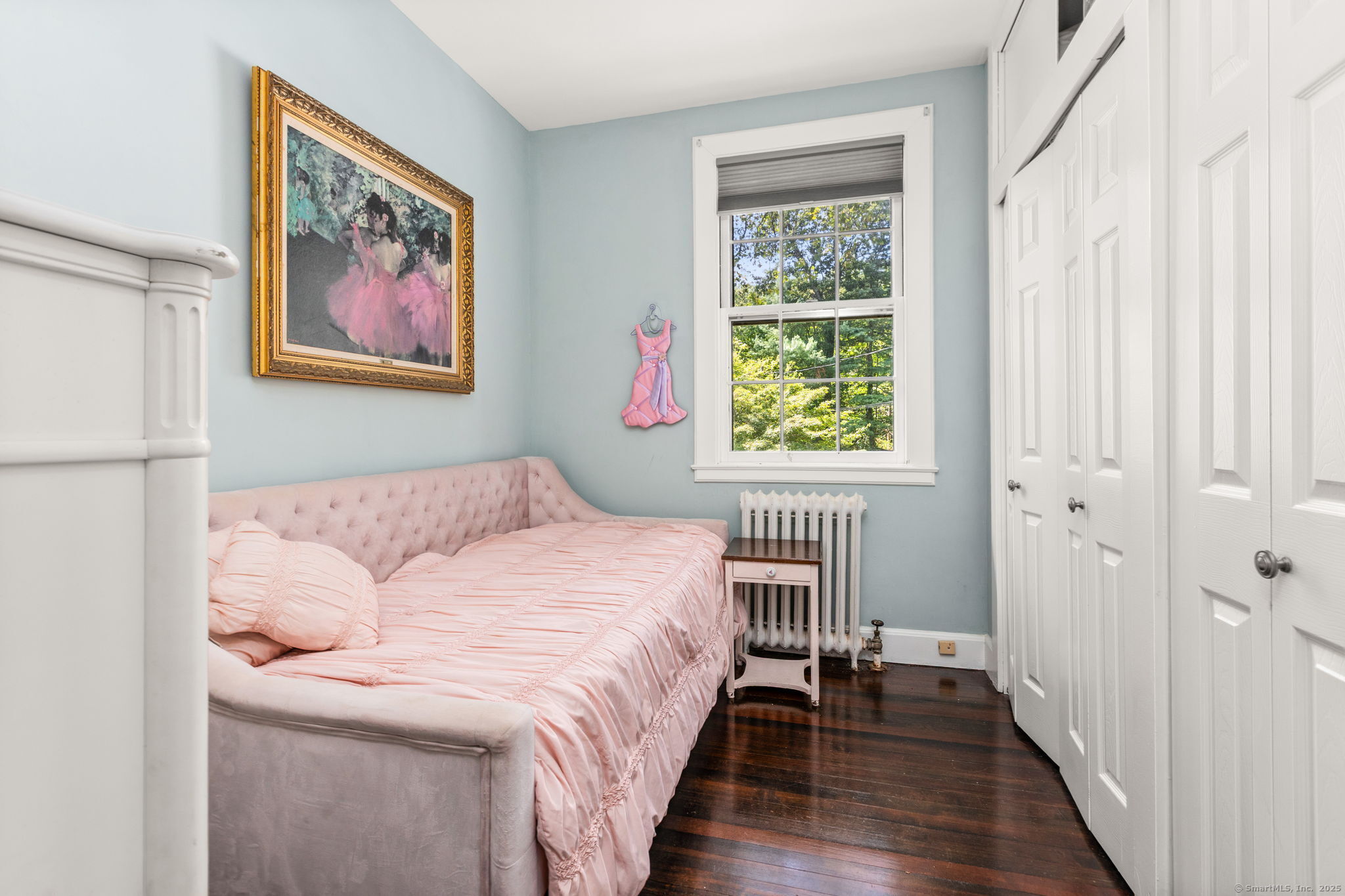 803 North Salem Road Ridgefield, CT 06877 - Photo 32 of 40 a bedroom with a bed and a painting on the wall