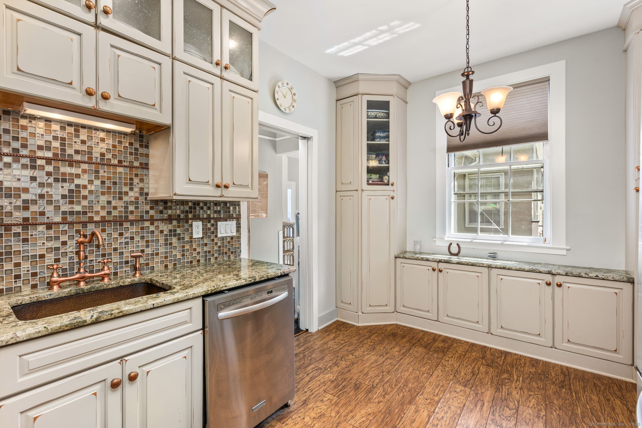 803 North Salem Road Ridgefield, CT 06877 - Photo 33 of 40 a view of a kitchen with granite countertop cabinets stainless steel appliances a sink and a window