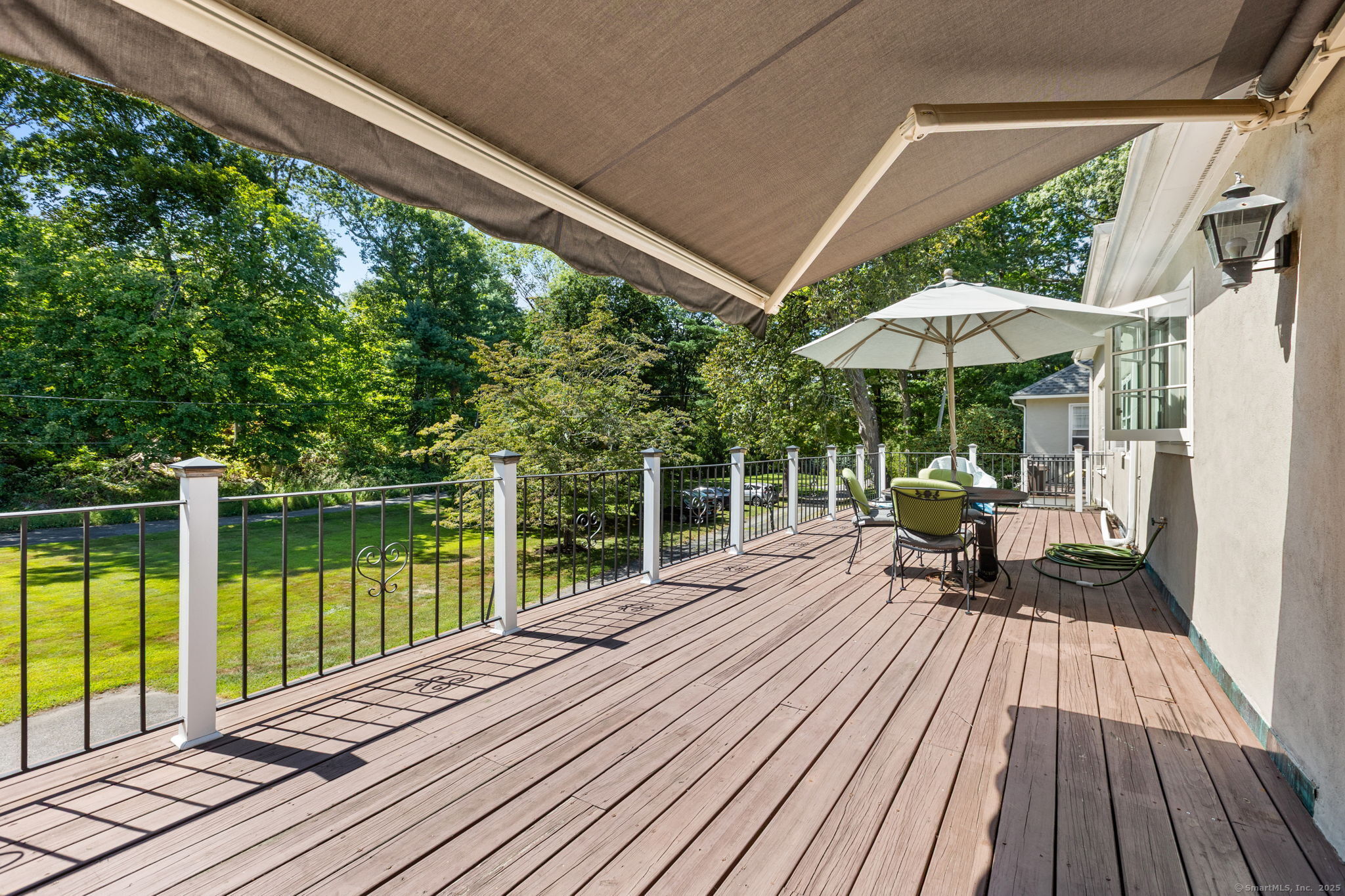 803 North Salem Road Ridgefield, CT 06877 - Photo 36 of 40 a view of balcony with wooden floor and outdoor seating