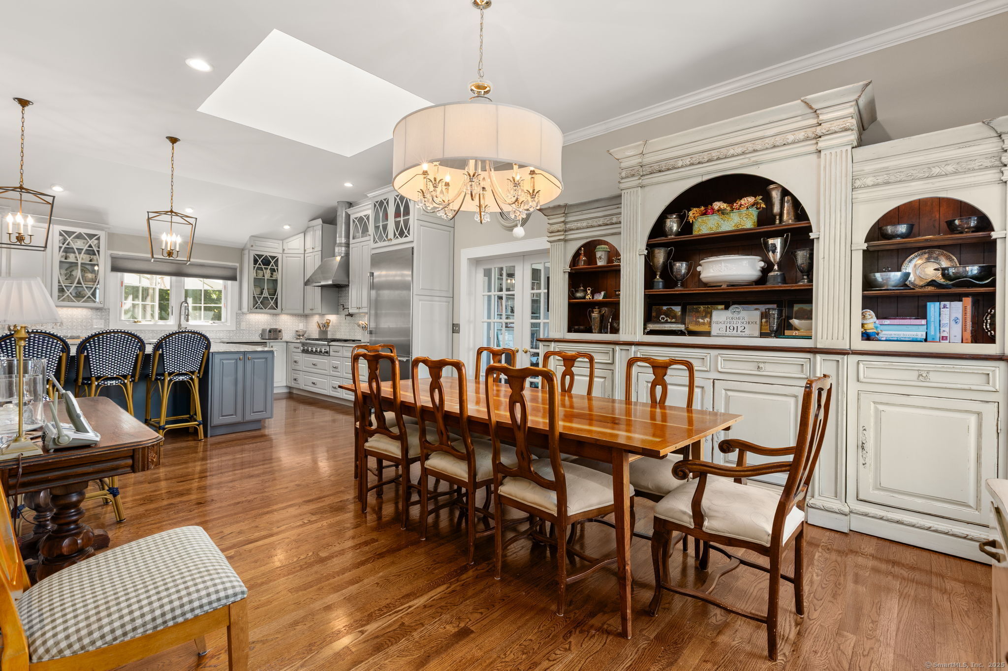 803 North Salem Road Ridgefield, CT 06877 - Photo 7 of 40 a view of a dining room with furniture and a chandelier