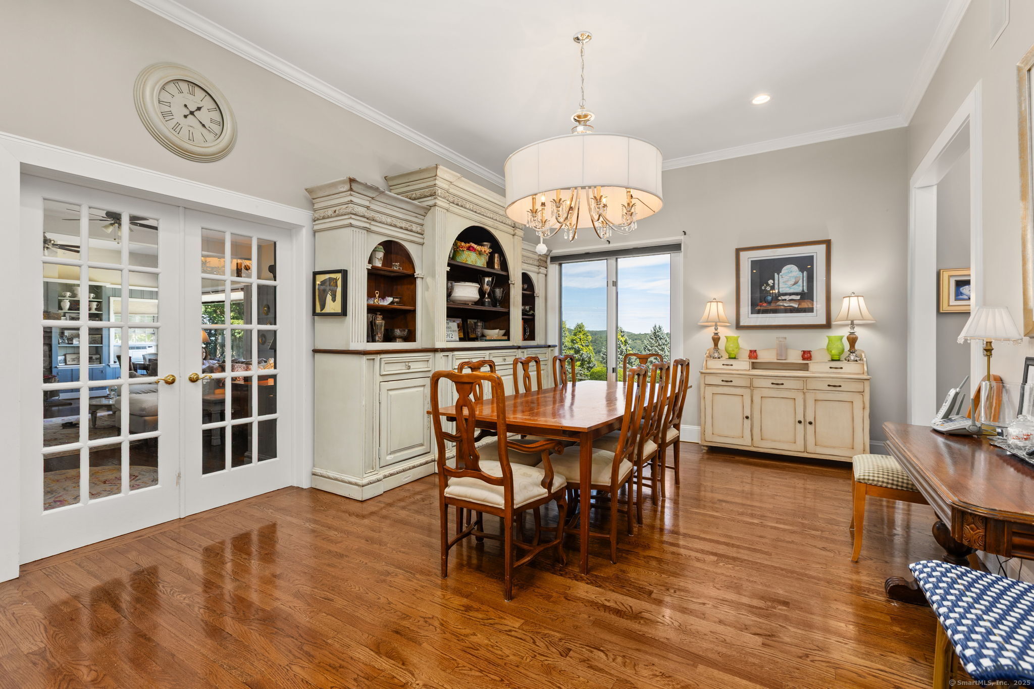 803 North Salem Road Ridgefield, CT 06877 - Photo 8 of 40 a view of a dining room with furniture window and wooden floor
