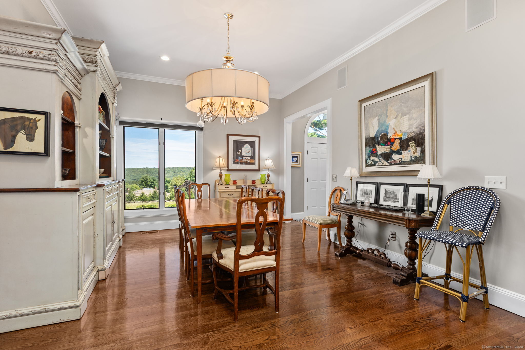 803 North Salem Road Ridgefield, CT 06877 - Photo 10 of 40 a view of a dining room with furniture window and wooden floor