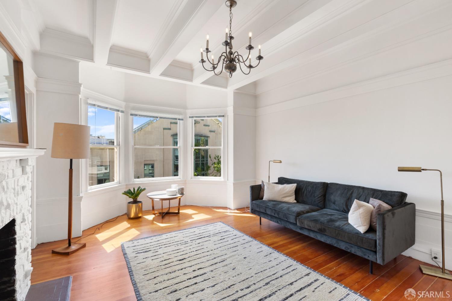 1968 Post Street San Francisco, CA 94115 - Photo 13 of 21 a living room with furniture and a chandelier