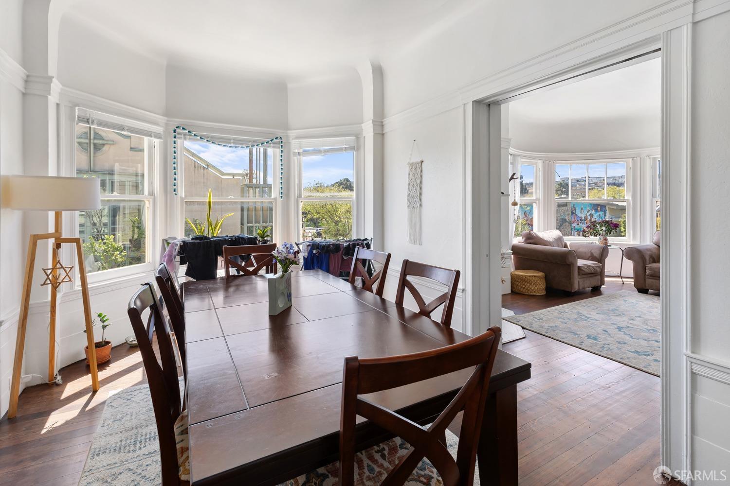 1968 Post Street San Francisco, CA 94115 - Photo 5 of 21 a view of a dining room with furniture window and wooden floor