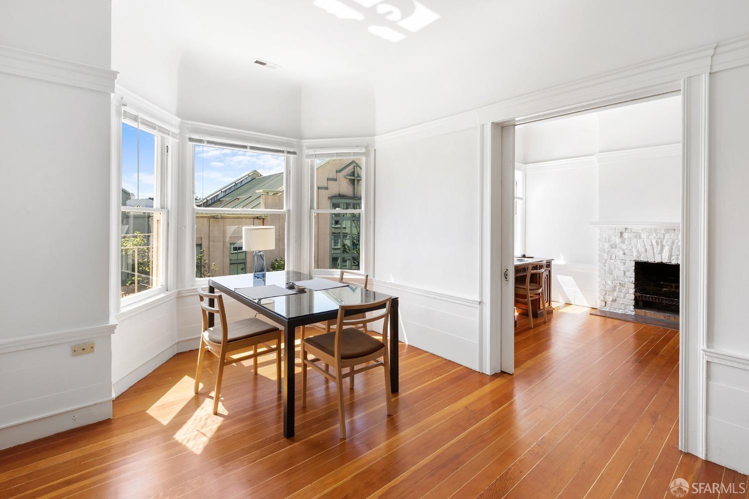 1968 Post Street San Francisco, CA 94115 - Photo 10 of 21 a view of a dining room with furniture window and wooden floor