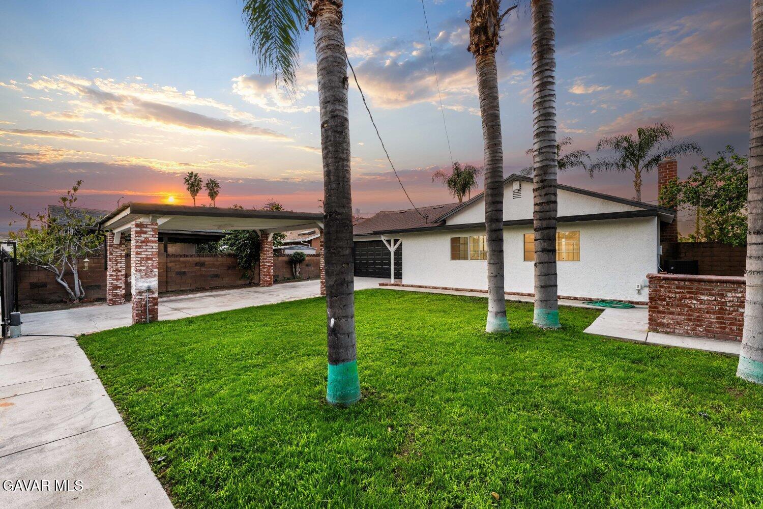 12338 Sheldon Street Sun Valley, CA 91352 - Photo 34 of 60 a view of a house with a backyard