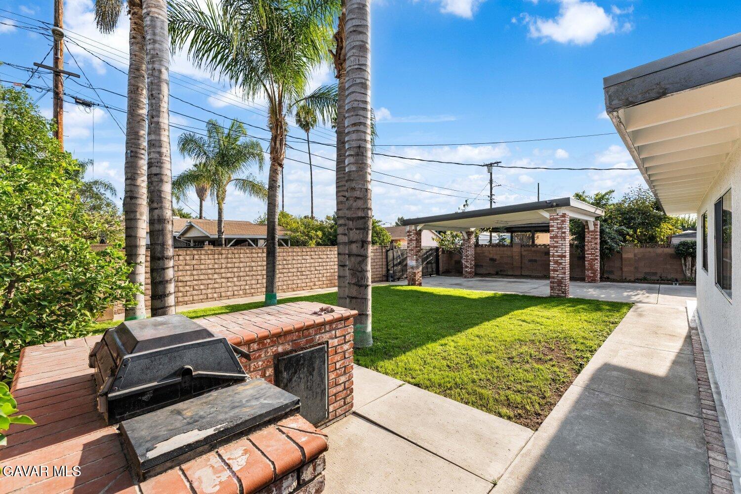 12338 Sheldon Street Sun Valley, CA 91352 - Photo 46 of 60 a view of a backyard with sitting area
