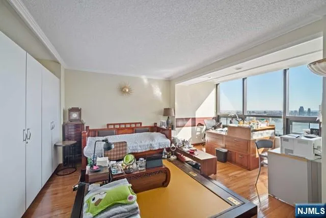 a room with gym equipment and a large window