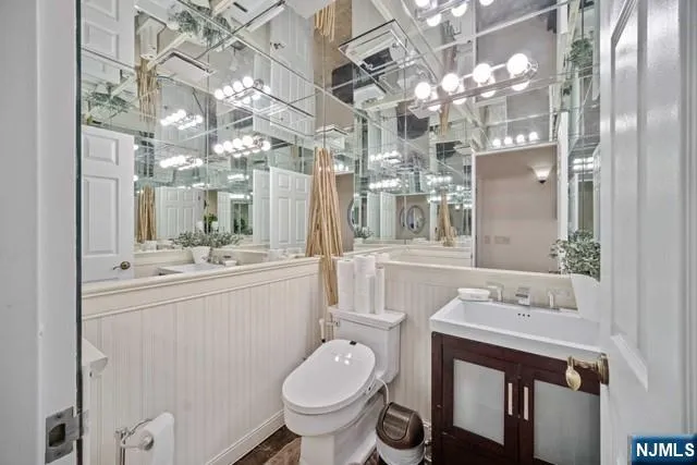 a view of a hallway with a chandelier