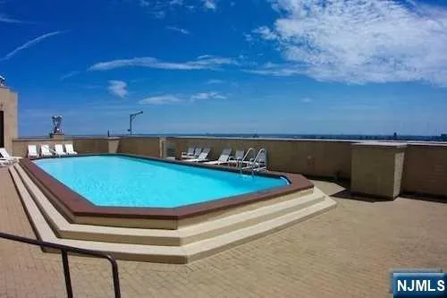a view of a pool in a patio