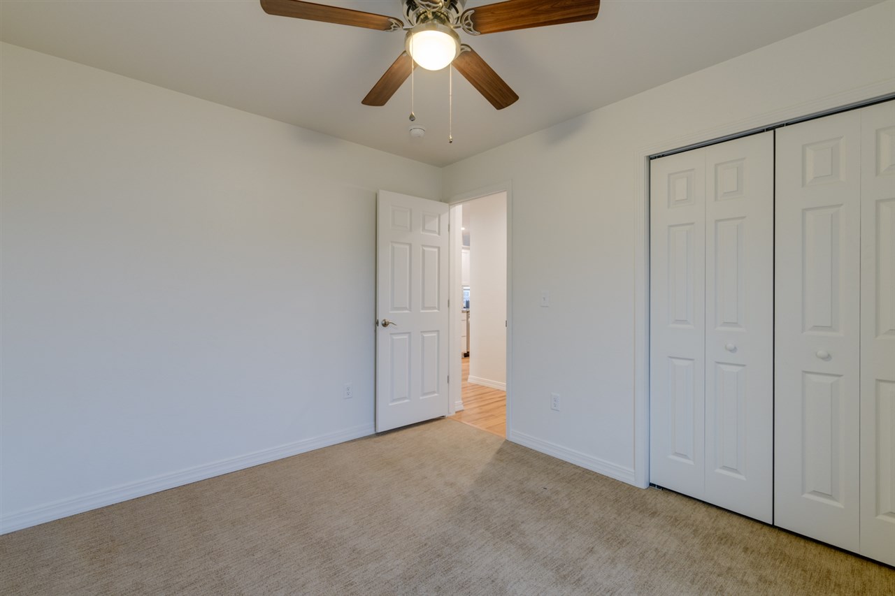 239 29 Road Grand Junction, CO 81503 - Photo 20 of 29 a view of an empty room and chandelier fan