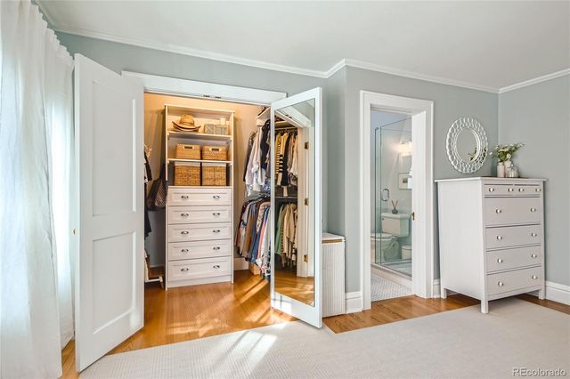 a view of a bedroom with closet area