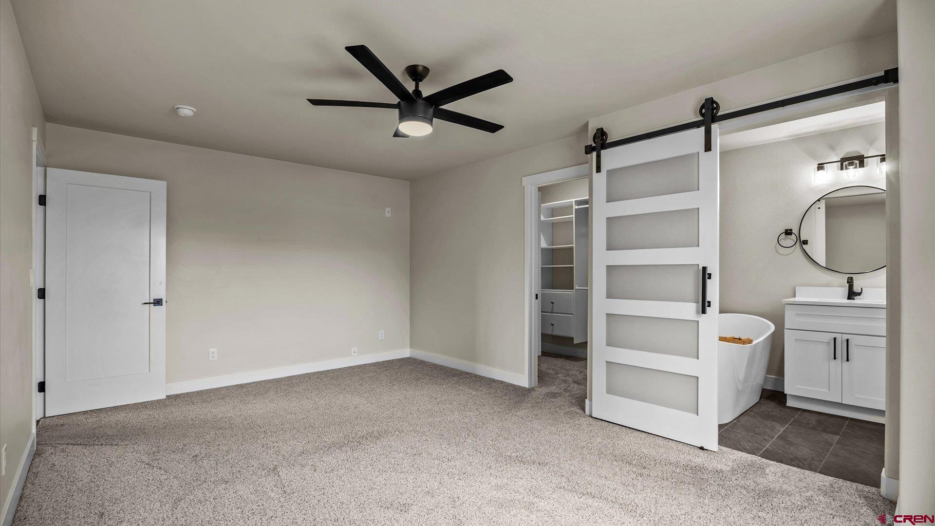 3312 East 1/4 Road Clifton, CO 81520 - Photo 23 of 43 a view of a livingroom with a staircase