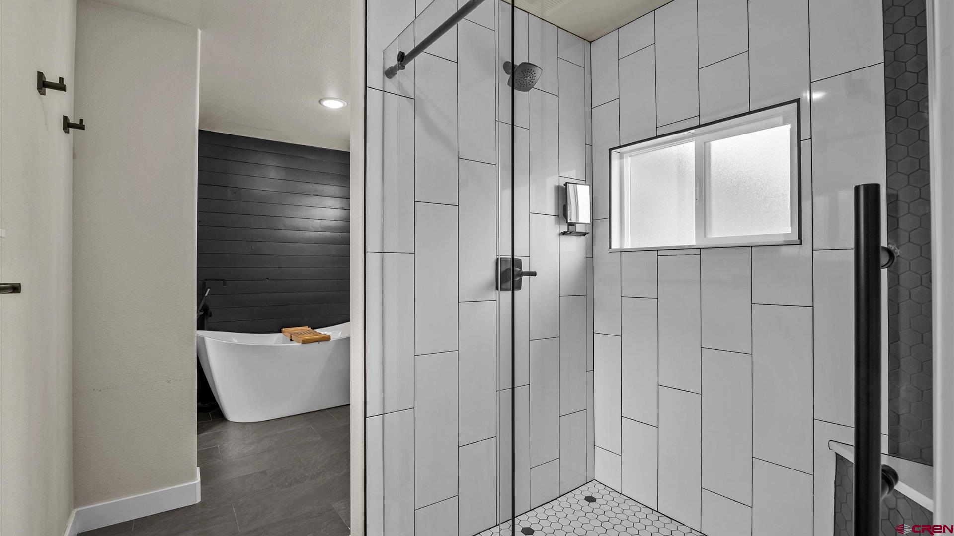 3312 East 1/4 Road Clifton, CO 81520 - Photo 25 of 43 a bathroom with a shower and a toilet