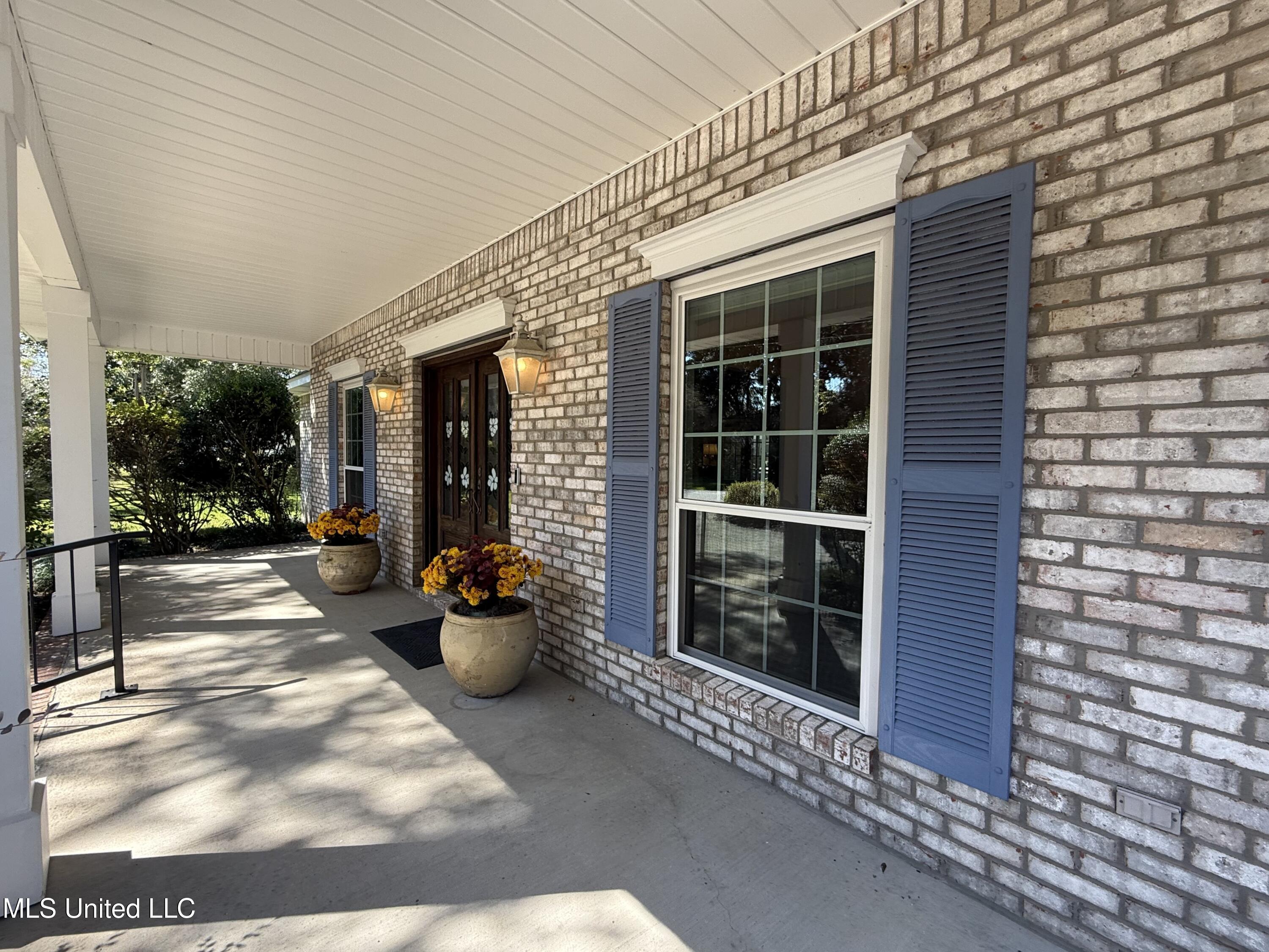 6303 Prado Road Ocean Springs, MS 39564 - Photo 3 of 56 Front Porch 1