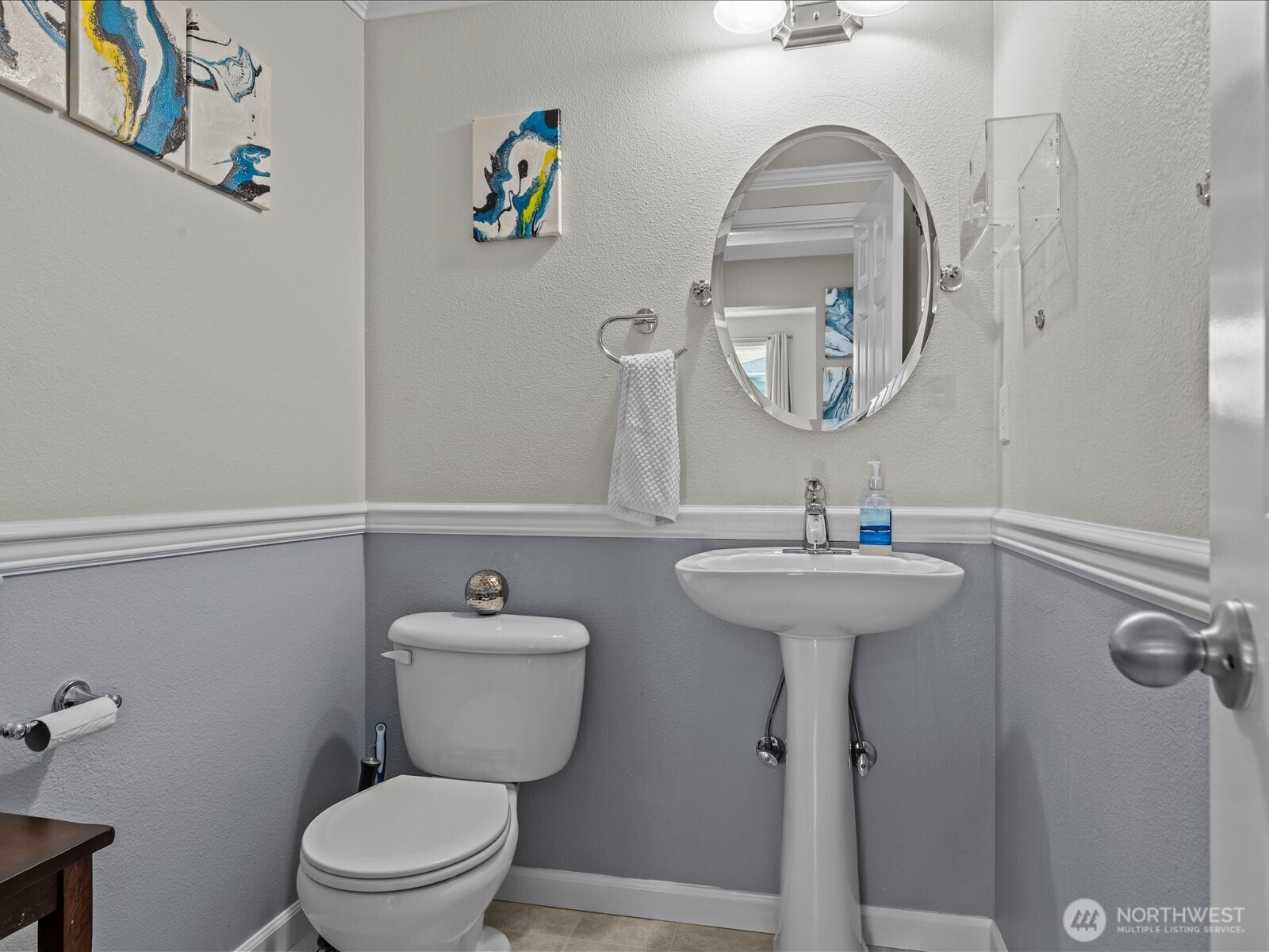 27450 237th Place Southeast Maple Valley, WA 98038 - Photo 11 of 35 a bathroom with a toilet sink and mirror