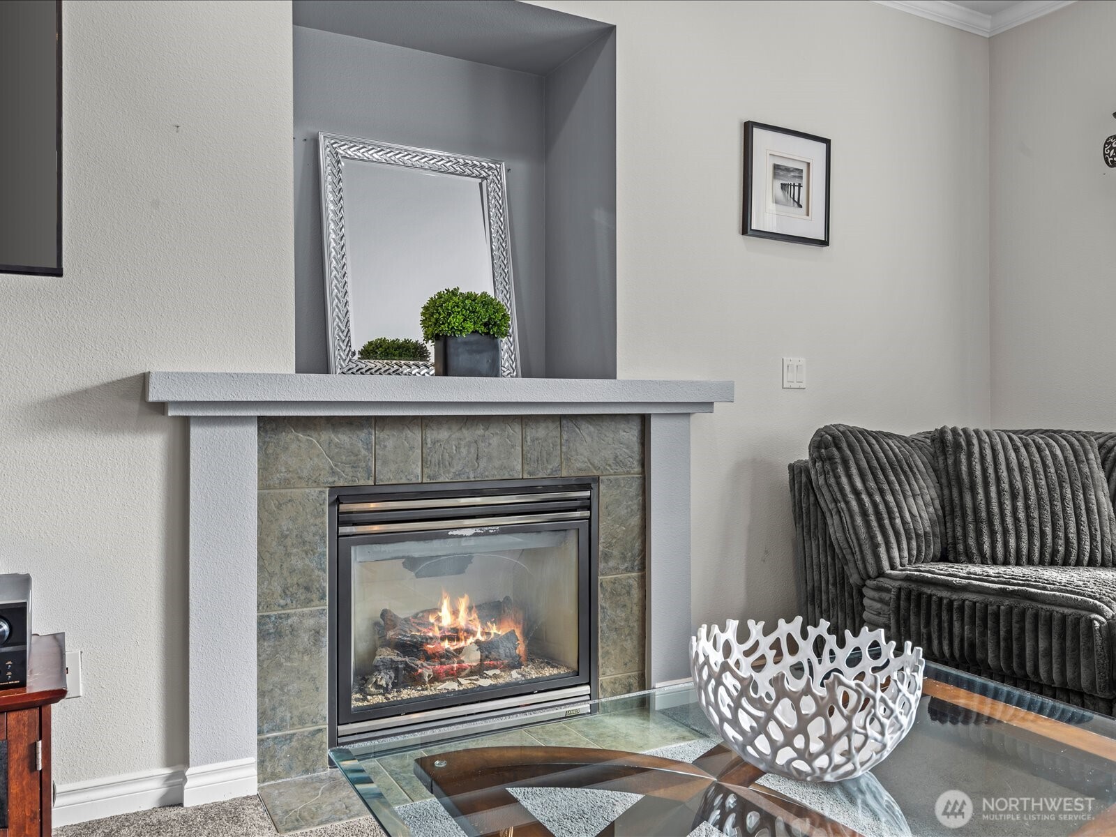 27450 237th Place Southeast Maple Valley, WA 98038 - Photo 16 of 36 a living room with furniture and a fireplace