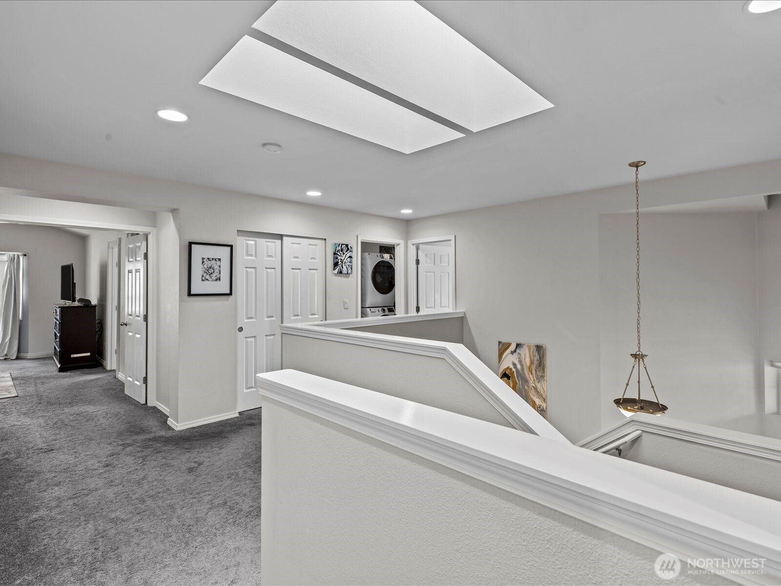 27450 237th Place Southeast Maple Valley, WA 98038 - Photo 21 of 36 a view of a livingroom with furniture and windows