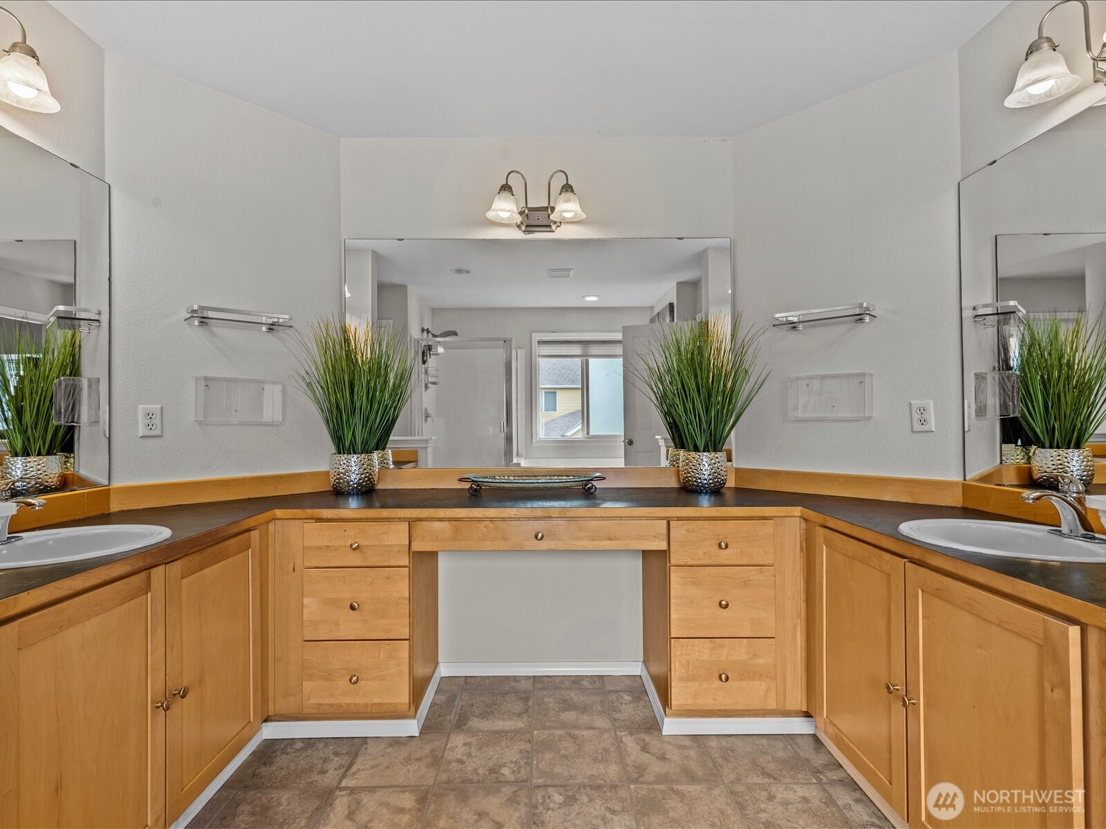 27450 237th Place Southeast Maple Valley, WA 98038 - Photo 29 of 36 a bath room with a sink and a mirror