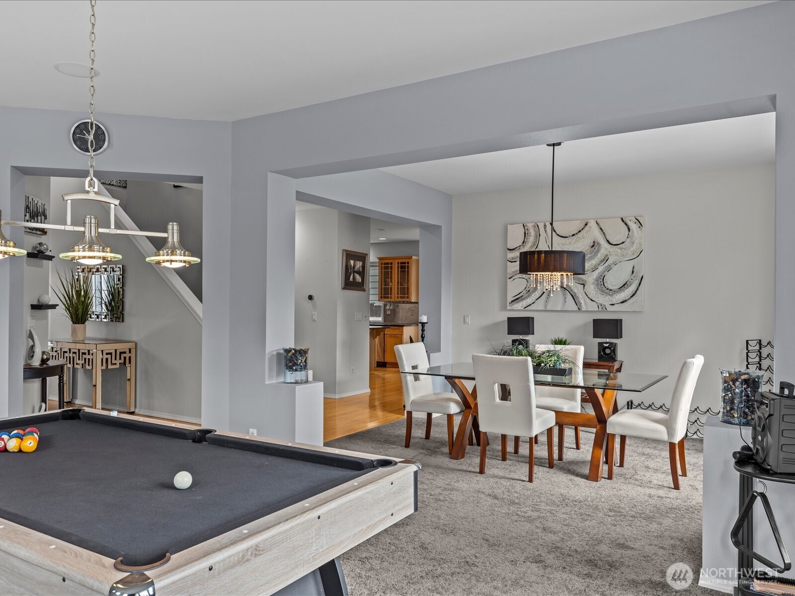27450 237th Place Southeast Maple Valley, WA 98038 - Photo 9 of 35 a living room with furniture pool table and chairs