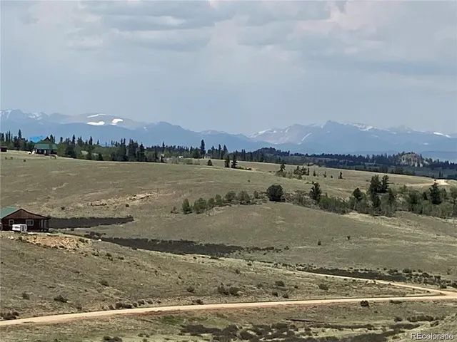 a view of a lake with a mountain