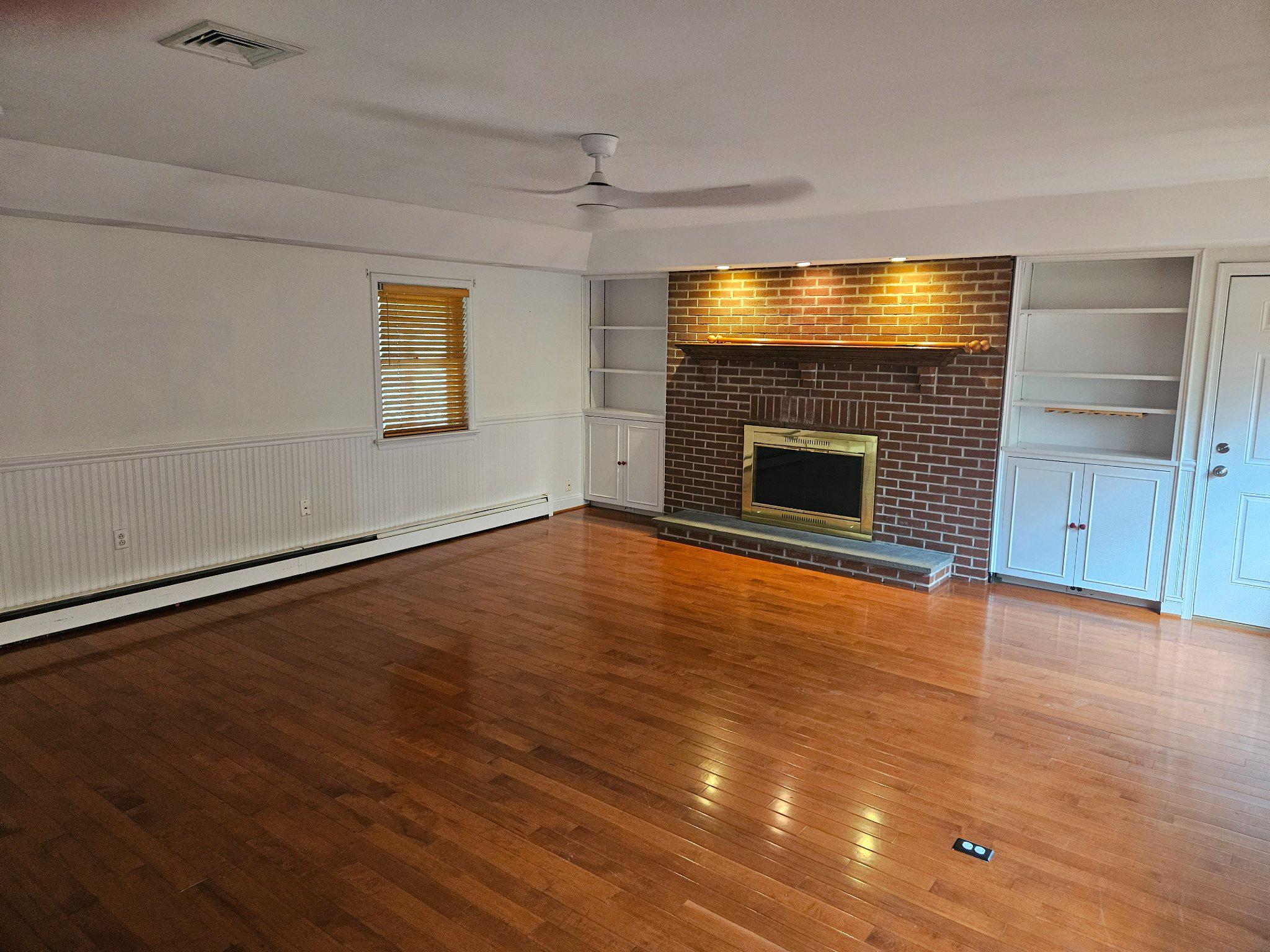 1255 Eagle Road West Chester, PA 19382 - Photo 5 of 15 Den with brick fireplace.