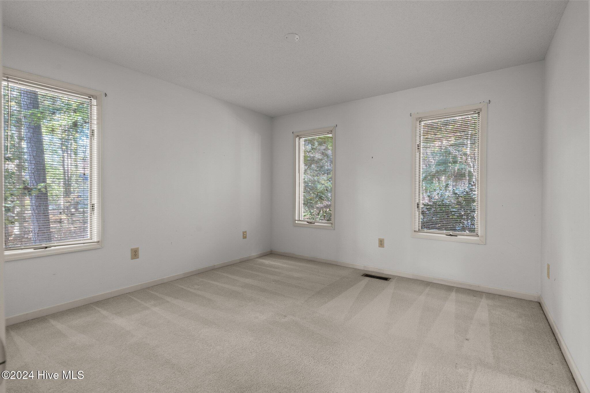 560 South Bethesda Road Southern Pines, NC 28387 - Photo 34 of 53 Second bedroom in front left of home.