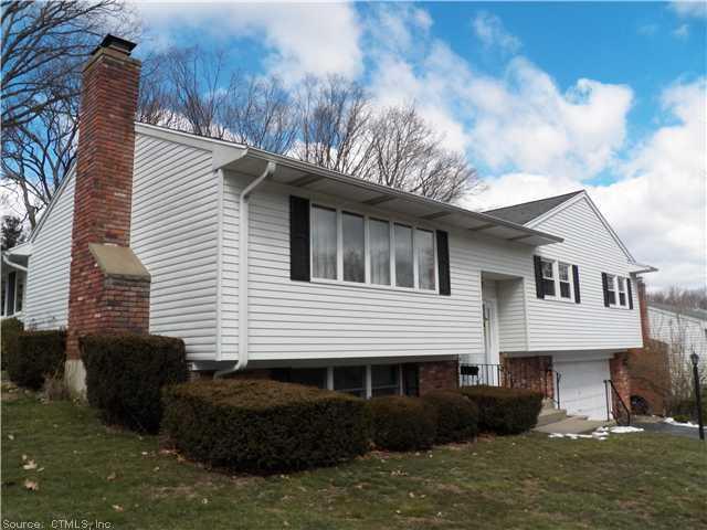 198 Ardsley Road Waterbury, CT 06708 - Photo 1 of 1 a front view of a house with garden