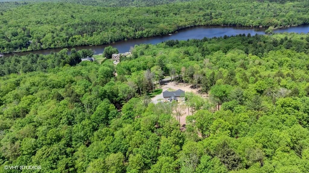 836 Starlight Road Monticello, NY 12701 - Photo 11 of 50 an aerial view of residential house with outdoor space and trees around