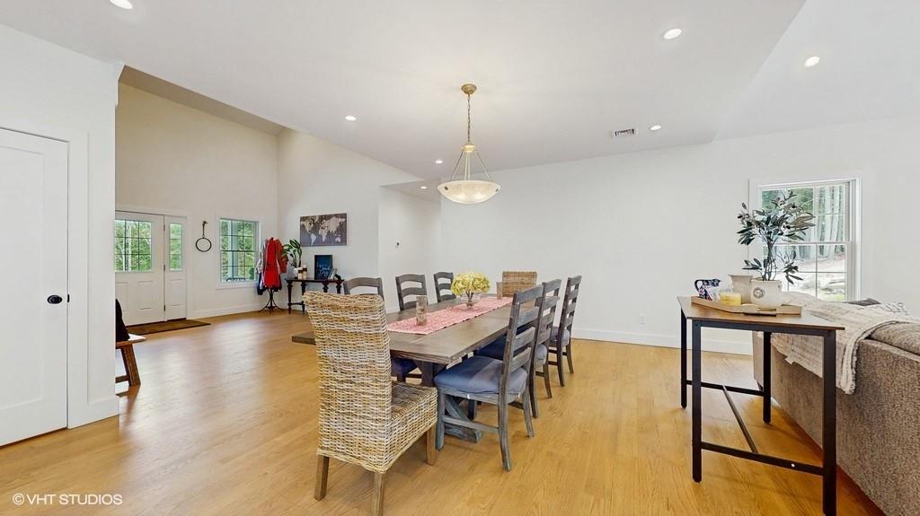 836 Starlight Road Monticello, NY 12701 - Photo 18 of 50 a view of a dining room with furniture and wooden floor