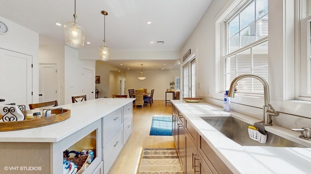 836 Starlight Road Monticello, NY 12701 - Photo 20 of 50 a large kitchen with kitchen island a large counter space a sink stainless steel appliances and cabinets