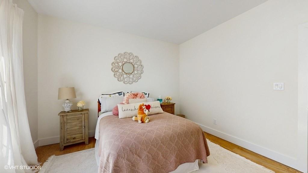 836 Starlight Road Monticello, NY 12701 - Photo 30 of 50 a bedroom with a bed and a refrigerator