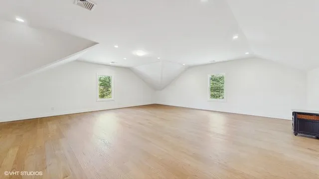 an empty room with a empty space and window