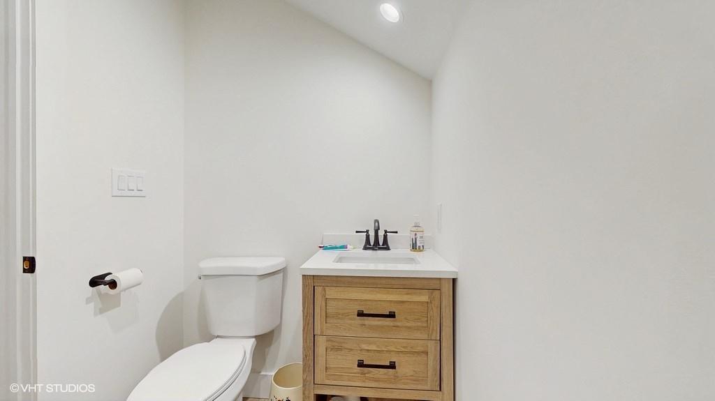 836 Starlight Road Monticello, NY 12701 - Photo 43 of 50 a bathroom with a sink vanity mirror and toilet