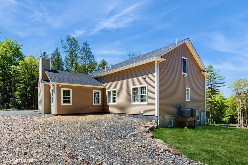 836 Starlight Road Monticello, NY 12701 - Photo 6 of 50 front view of a house with a yard