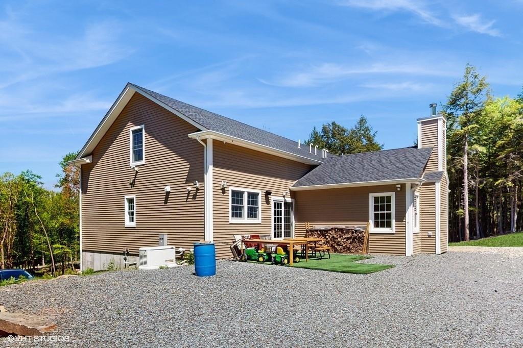 836 Starlight Road Monticello, NY 12701 - Photo 8 of 50 a front view of a house with garden