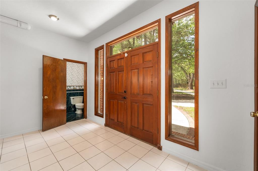 4703 Northwest 124th Street Gainesville, FL 32606 - Photo 11 of 55 a view of an empty room and window