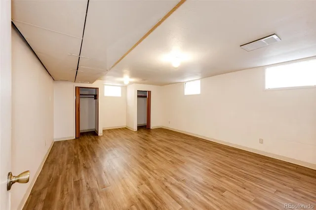 a bathroom with a toilet a sink and shower