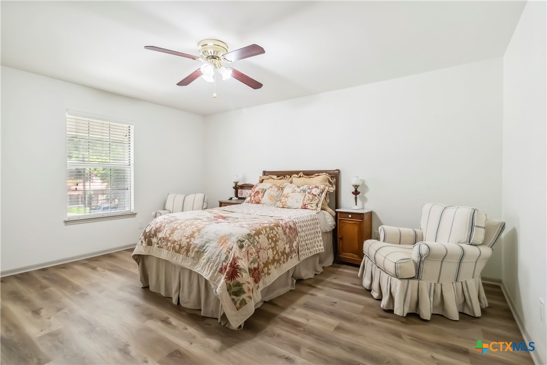 425 West Edgewater Terrace New Braunfels, TX 78130 - Photo 24 of 45 a bedroom with a bed and window