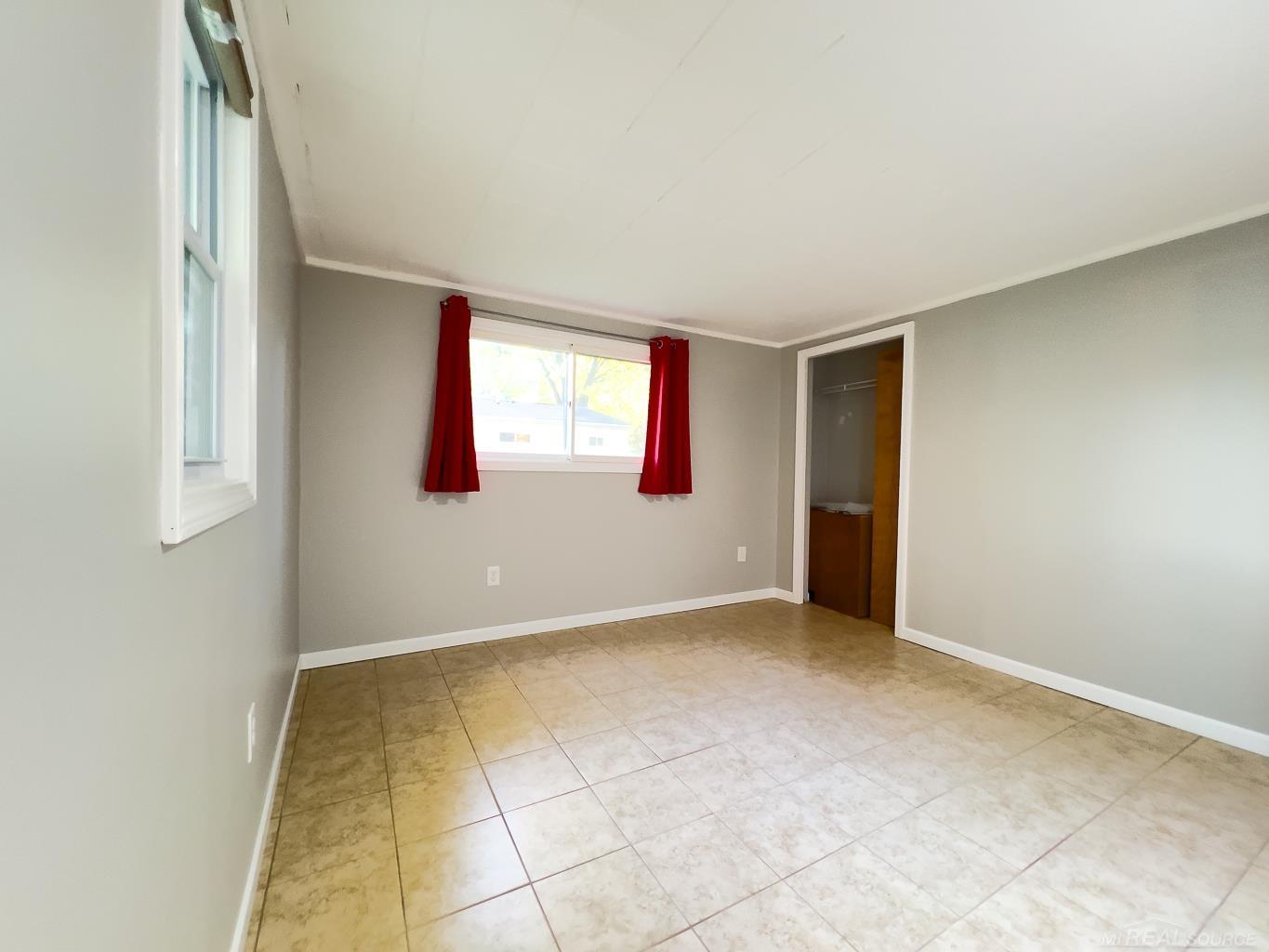 1123 Radov Road Gladwin, MI 48624 - Photo 20 of 29 Complete with adjoining half bath and a full bath right outside the door.