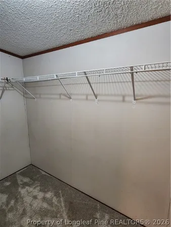 a view of a room with racks on the wall