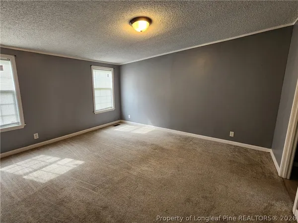 an empty room with windows