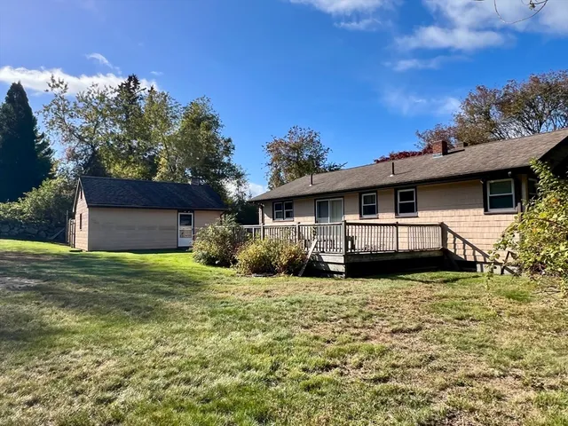 a view of a house with a big yard
