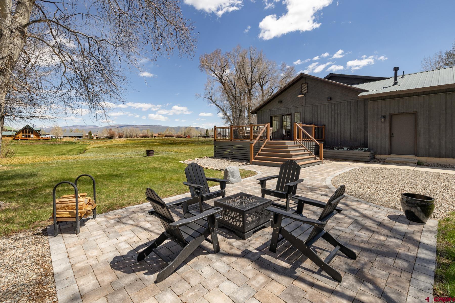 389 Apache Road Gunnison, CO 81230 - Photo 24 of 43 a view of a terrace with chair and water view